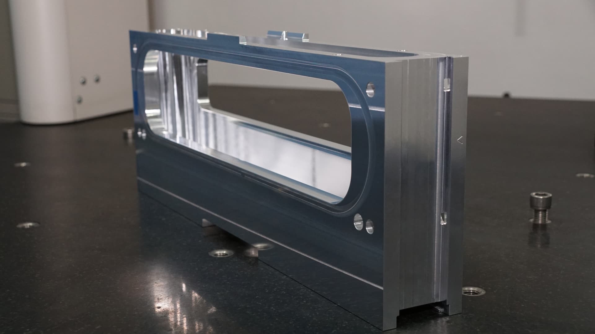Precision 5-axis CNC milled aluminum structural bracket for aerospace and optics