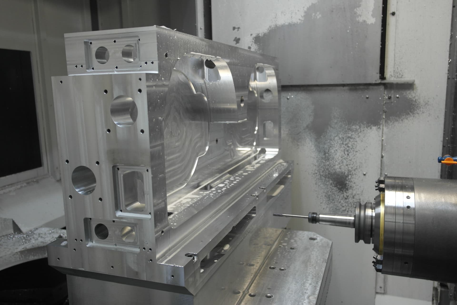A CNC milling machine in operation, carving out intricate designs with precision and speed